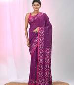 Elegant purple cotton saree with geometric floral borders