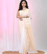 Elegant white and beige striped cotton handspun saree with pom pom border