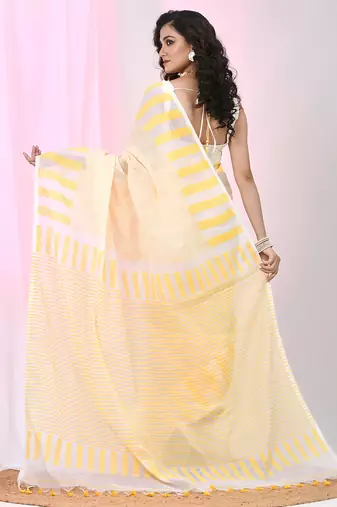 Elegant white and yellow striped cotton handspun saree with pom pom border