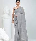 Elegant grey cotton saree with sequin embellishments and pom pom
