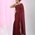 Elegant maroon cotton saree with sequin embellishments and pom pom
