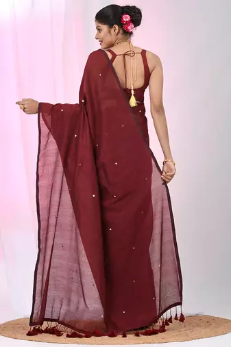 Elegant maroon cotton saree with sequin embellishments and pom pom
