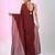 Elegant maroon cotton saree with sequin embellishments and pom pom