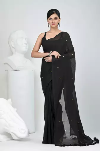 Elegant black cotton saree with sequin embellishments and pom pom
