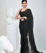 Elegant black cotton saree with sequin embellishments and pom pom