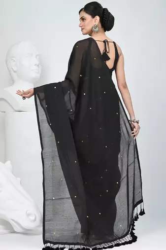 Elegant black cotton saree with sequin embellishments and pom pom