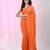 Elegant orange cotton saree with sequin embellishments and pom pom