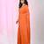 Elegant orange cotton saree with sequin embellishments and pom pom