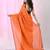 Elegant orange cotton saree with sequin embellishments and pom pom
