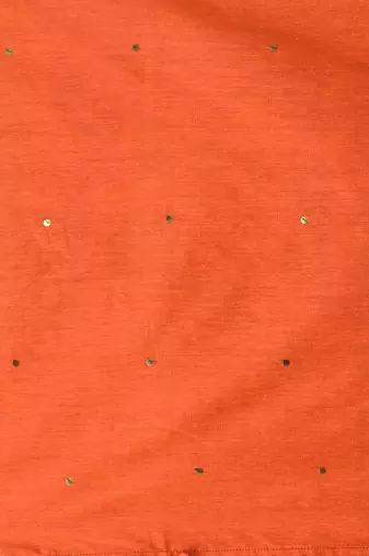 Elegant orange cotton saree with sequin embellishments and pom pom