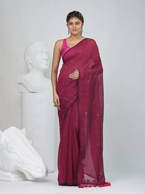 Elegant magenta cotton saree with sequin embellishments and pom pom 1