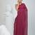 Elegant magenta cotton saree with sequin embellishments and pom pom