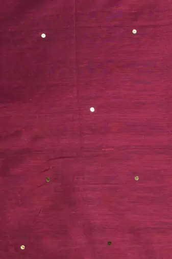 Elegant magenta cotton saree with sequin embellishments and pom pom