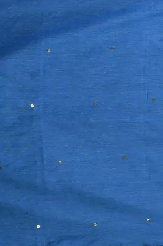 Elegant sapphire blue cotton saree with sequin embellishments and pom pom