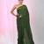 Elegant green cotton saree with sequin embellishments and pom pom