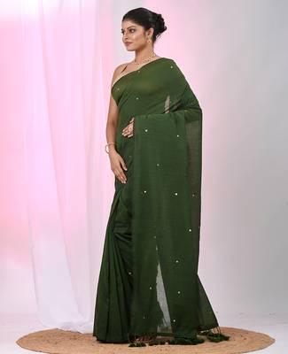 Elegant green cotton saree with sequin embellishments and pom pom 2