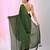 Elegant green cotton saree with sequin embellishments and pom pom