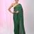 Elegant green cotton saree with sequin embellishments and pom pom