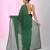 Elegant green cotton saree with sequin embellishments and pom pom