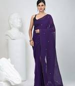 Elegant purple cotton saree with sequin embellishments and pom pom