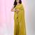 Elegant corn yellow cotton saree with sequin embellishments and pom pom