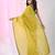 Elegant corn yellow cotton saree with sequin embellishments and pom pom