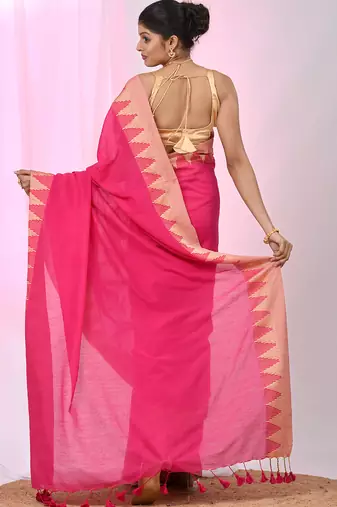 Elegant pink cotton saree with geometric border and pom pom