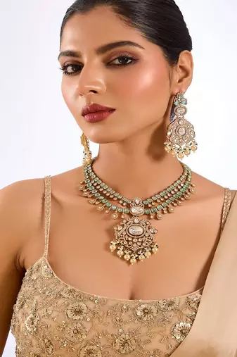 Gold plated green stone layered necklace set