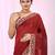 Dark red cotton saree with beige border and traditional woven pallu
