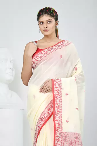 Off white cotton saree with beige border and traditional woven pallu