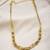 Gold finish cz stones golden beads necklace
