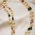Two layers pearl necklace with red and green beads