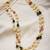 Two layers pearl necklace with red and green beads