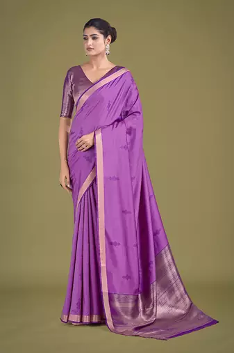 Charming lavender color silk golden zari woven ceremony saree