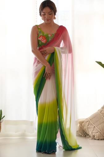 green pedding color embroidery work faux georgette saree with blouse piece