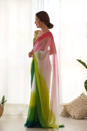 green pedding color embroidery work faux georgette saree with blouse piece