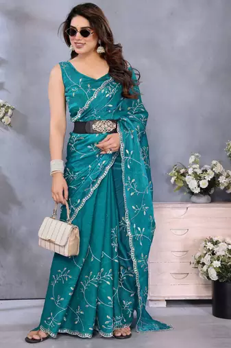Elegant Teal Embroidered Jimmy Chu Saree with Rich Lace Work