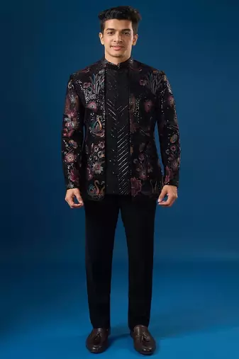 Black embroidered velvet bandhgala jacket paired with pant