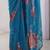 Trendy Teal Blue Georgette Silk Printed Saree with Designer Moti Lace Border