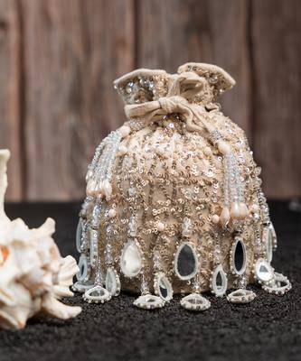 ivory mirror & sequin embroidered silk potli bag 1