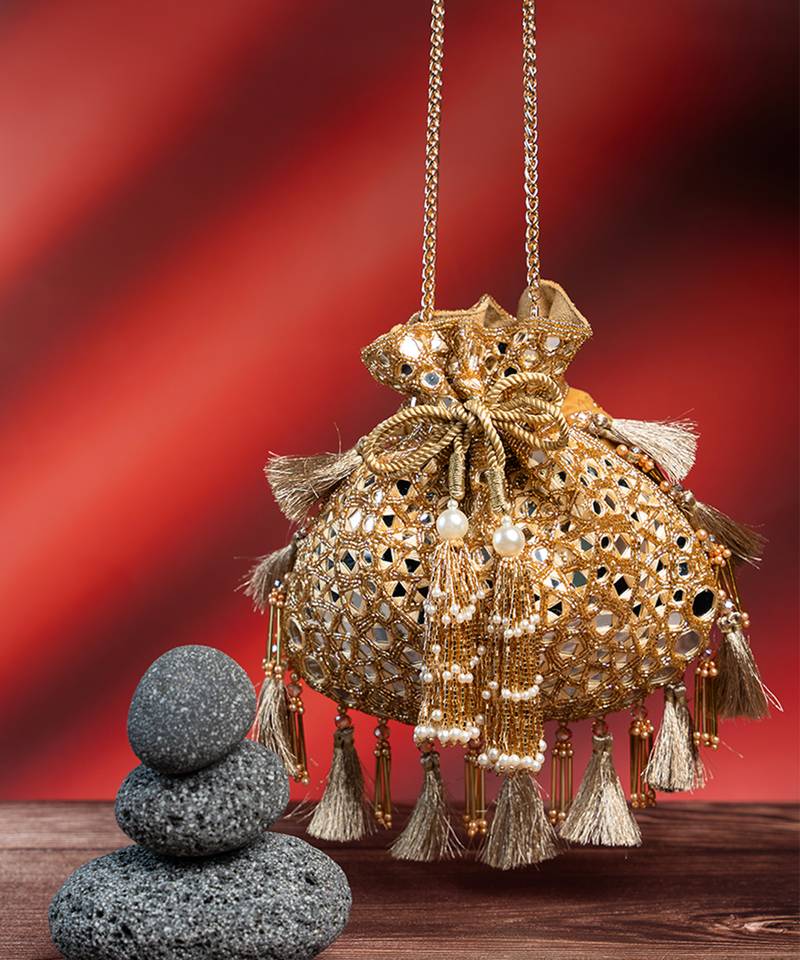 Gold silk mirror embroidered potli bag