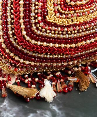 red & gold beaded embroidered silk potli bag 3