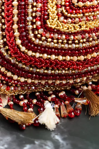 red & gold beaded embroidered silk potli bag