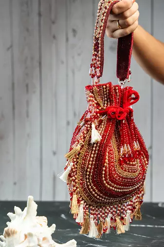red beaded embroidered silk potli bag