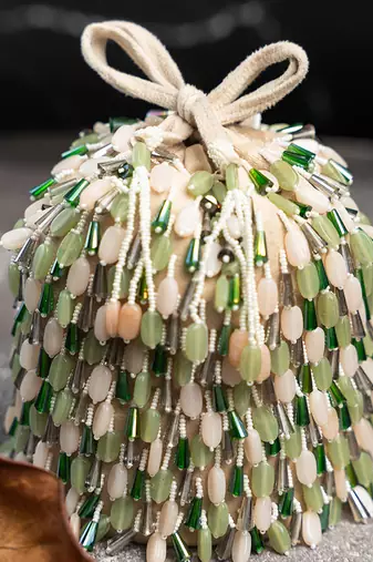 green ivory beaded embroidered suede potli bag