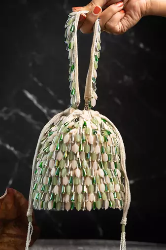 green ivory beaded embroidered suede potli bag