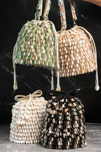 green ivory beaded embroidered suede potli bag