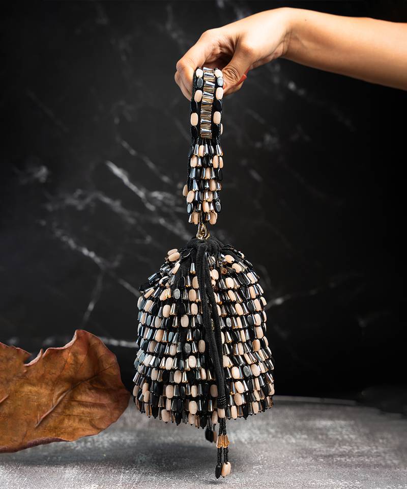 Black suede embroidered potli bag