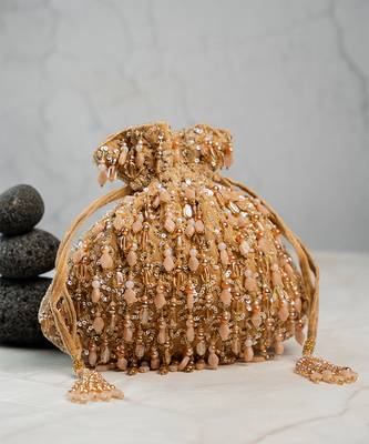 gold beaded tassel embroidered silk potli bag 1