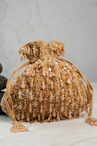 Gold silk embroidered potli bag